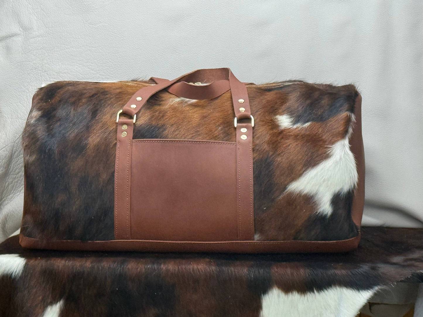 Hair on tri-colored duffle #3