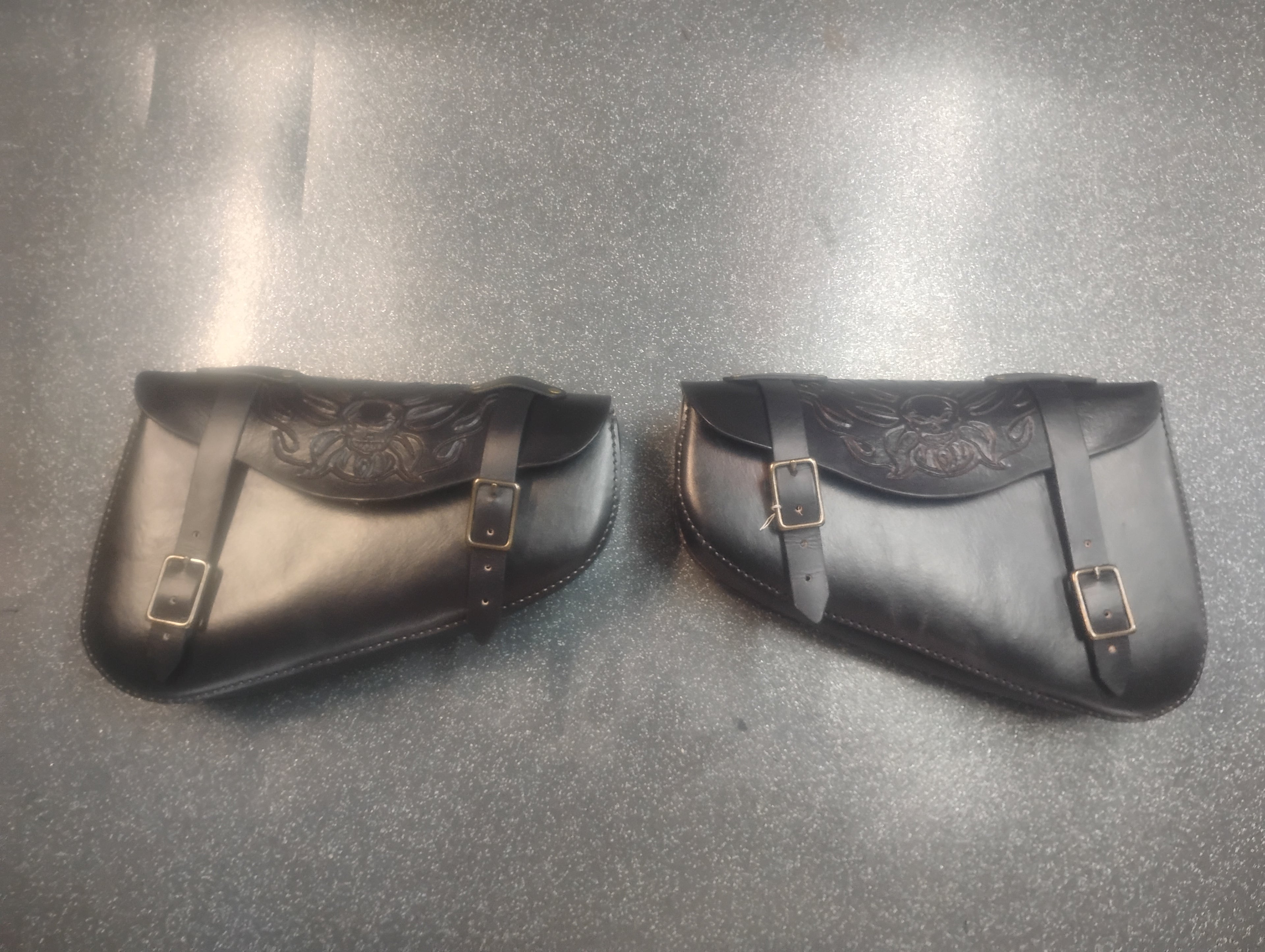 Hand carved Motorcycle saddlebags (Black Skulls)